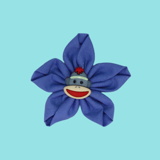 Mr. Monkey Mischief Clip – Periwinkle Petals with Sock Monkey Center